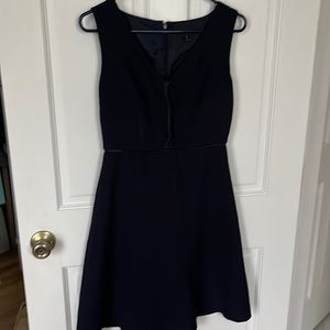 Blue mini dress with textured fabric and leather embellishments